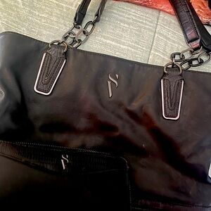 Gently used, Black the brand is Vera Wang